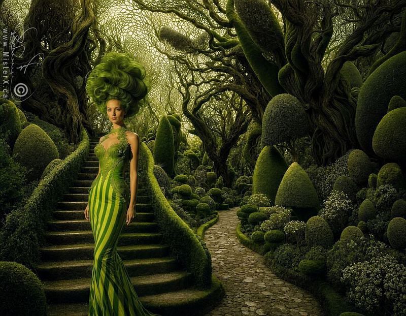 A woman in a striped lime green gown strolls thru a surreal green garden.